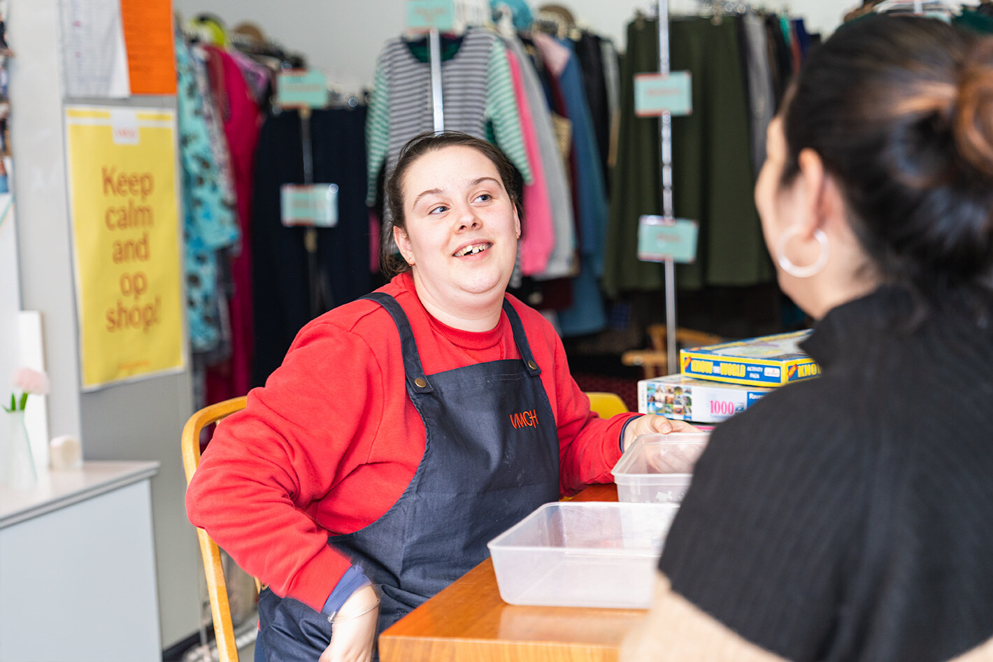 Sarah-enjoys-working-in-the-op-shop-warehouse-2